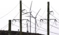 Wind turbines behind electricity wires near Canberra.