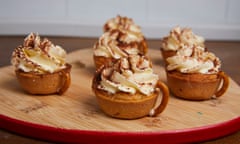 Blueberry frangipane and fresh cream mini tarts.