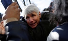 Rod Blagojevich receives a hug from a supporter outside his home in the Ravenswood suburb of Chicago