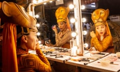 Darcel Osei, Makoto Iso, finalise their makeup at Lion King at the Lyceum Theatre.