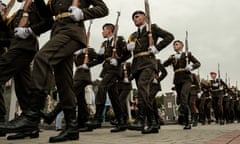 An honour guard marches at a commemoration ceremony for Ukrainian defenders at Lychakiv cemetery on Sunday in Lviv, Ukraine. Joe Biden has urged congressional Republicans to pass a separate Ukraine aid bill.