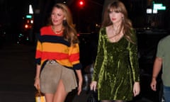 Taylor Swift (right) in the olive-green dress walks with with Blake Lively in Brooklyn, New York