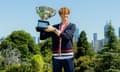 Jannik Sinner poses in Melbourne with the trophy after winning the Australian Open final against Daniil Medvedev.