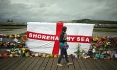 Floral tributes to the victims of the disaster near the A27 at Shoreham.