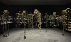 All the King’s Men (2014–15) by Fiona Hall, is made up of knitted camouflage uniforms intertwined with wire, animal bone, horns, teeth, boxing gloves, dice and pool balls.