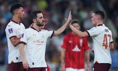 Bernardo Silva and Phil Foden celebrate Silva’s goal in the semi-final win over Urawa Reds.