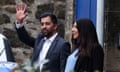 Humza Yousaf waves alongside his wife, Nadia El-Nakla