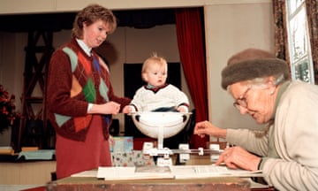 He ain’t heavy … Baby weighing. 1992.