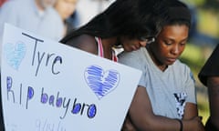 Members of Tyre King’s family console each other during a vigil for 13-year-old Tyre King Thursday, Sept. 15, 2016, in Columbus, Ohio. King was shot and killed by Columbus police Wednesday evening. (AP Photo/Jay LaPrete)