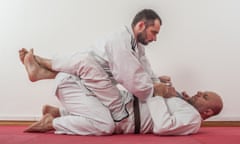 Brazilian jiu-jitsu training demonstration in traditional kimono