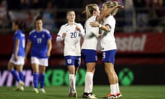 Rachel Daly of England celebrates scoring her team's fifth goal with teammate Lauren Hemp.