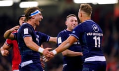 Finn Russell celebrates with Jamie Ritchie (left) and Duhan van der Merwe (right) during Scotland’s win in Cardiff