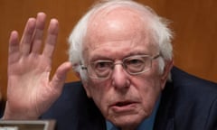 Bernie Sanders raises his hand.