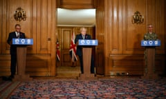 Prime Minister Boris Johnson flanked by Brigadier Joe Fossey and Deputy Chief Medical Officer for England Jonathan Van-Tam at a briefing in Downing Street.