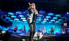 Day 1 - Glastonbury Festival<br>GLASTONBURY, ENGLAND - JUNE 27:  Win Butler of Arcade Fire performs as the band headline the Pyramid Stage on Day 1 of the Glastonbury Festival at Worthy Farm on June 27, 2014 in Glastonbury, England.  (Photo by Samir Hussein/Redferns via Getty Images)