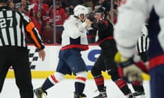 Alex Ovechkin and Andrei Svechnikov fought during the first period of Monday’s game