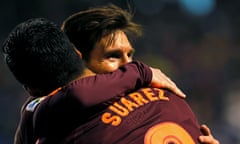 Lionel Messi and Luis Suárez celebrate winning the title.