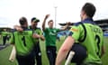 Paul Stirling and Lorcan Tucker celebrate with their Ireland teammates in Hobart