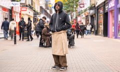 Rich Pelley models his £15 John Lewis towel in Carnaby Street