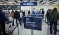 Border Force check the passports of passengers arriving at Gatwick Airport