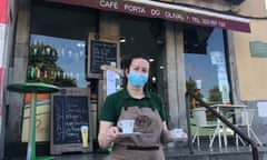 A waitress serves coffee outside at Café Porta do Olival in Porto