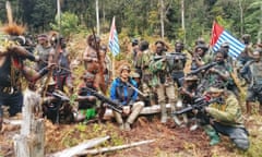 Rebels in Indonesia's Papua say images show abducted New Zealand pilot in good health<br>A man who is identified as Philip Mehrtens, the New Zealand pilot who is said to be held hostage by a pro-independence group, sits among the separatist fighters in Indonesia's Papua region, March 6, 2023. The West Papua National Liberation Army (TPNPB)/Handout via REUTERS THIS IMAGE HAS BEEN SUPPLIED BY A THIRD PARTY. MANDATORY CREDIT NO RESALES. NO ARCHIVES