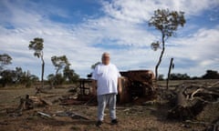 Howard Riley stands in front of a dilapidated 1940s Chevrolet ambulance, which would have transported sick or dead people at Moore River mission in Western Australia