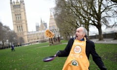 Parliamentary Pancake Race in Westminster<br>epa06520554 Television journalist Alastair Stewart poses before the annual Parliamentary Pancake Race in Westminster in London, Britain,13 February 2018. The race is held on Shrove Tuesday between members of the Houses of Lords and Commons and members of media to raise money for charity. EPA/NEIL HALL