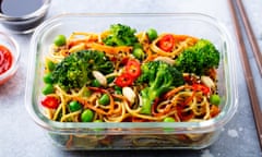 Stir fry udon noodles, with vegetables in lunch box.