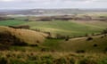 View of rolling green fields on Iford estate from South Downs Way
