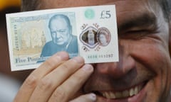 Mark Carney Makes First Transaction With New Polymer Fiver<br>LONDON, UNITED KINGDOM - SEPTEMBER 13: Bank of England governor Mark Carney poses with a new polymer five pound note at Whitecross Street Market on September 13, 2016 in London, United Kingdom. The new plastic note is designed to be more durable and features a portrait of former British Prime Minister Sir Winston Churchill. (Photo by Stefan Wermuth - WPA Pool/Getty Images)