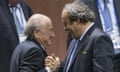 FILE - In this Friday, May 29, 2015 file photo, FIFA president Sepp Blatter after his election as President, left, is greeted by UEFA President Michel Platini, right, at the Hallenstadion in Zurich, Switzerland. On Friday, Sept. 25, 2015 Swiss attorney general opened criminal proceedings against FIFA President Sepp Blatter. (Patrick B. Kraemer/Keystone via AP, File)