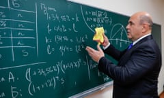 Russian PM Mishustin on working trip to Moscow Region<br>MOSCOW REGION, RUSSIA - SEPTEMBER 1, 2021: Russia's Prime Minister Mikhail Mishustin writes on a chalkboard while visiting the Kapitsa Physics and Technology Lyceum in the town of Dolgoprudny on Knowledge Day. Dmitry Astakhov/POOL/TASS (Photo by Dmitry Astakhov\TASS via Getty Images)