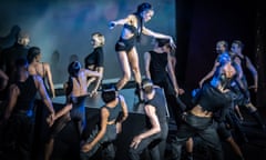 FKA Twigs performs on stage with about a dozen dancers