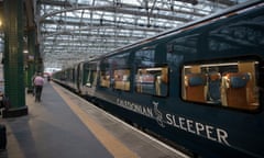 A Caledonian Sleeper train at a station