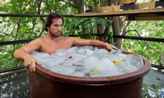 Man in ice bath during a yoga class