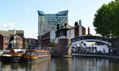 Birmingham old and new … narrowboats on Broad Street canal basin with the 25-storey Cube building behind.