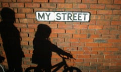 Coalition Government Unveils Spending Review To Tackle Country's Deficit<br>MANCHESTER, ENGLAND - OCTOBER 20:  (PARENTAL PERMISSION OBTAINED) The shadows of children playing are cast on the wall of My Street in Salford, which has a high percentage of council homes on October 20, 2010 in Manchester, England. The Chancellor of the Exchequer George Osborne has today announced the coalition government's spending review in Parliament. After slashing welfare and housing benefits many have commented that it is the poorest who will suffer most from the spending cuts.  (Photo by Christopher Furlong/Getty Images)