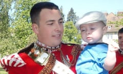Lee Rigby pictured in 2011 with his son Jack.