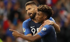 France's Kingsley Coman, right, celebrates his opening goal with France's Olivier Giroud during the Euro 2020 group H qualifying soccer match between France and Albania at the Stade de France in Saint Denis, north of Paris, France, Saturday, Sept. 7, 2019. (AP Photo/Christophe Ena)