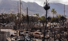 Destroyed buildings and cars are seen in the aftermath of the Maui wildfires in Lahaina, Hawaii, on 16 August. 