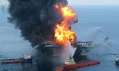 TO GO WITH AFP STORY BY ANDREW BEATTY (FILES) This file handout photo taken on April 21, 2010 by the US Coast Guard shows fire boat response crews as they battle the blazing remnants of the BP operated off shore oil rig, Deepwater Horizon, in the Gulf of Mexico. The White House blocked new leases for oil and gas drilling in sections of the Arctic and Atlantic on December 20, 2016, a high-stakes bid to forestall exploration and tie Donald Trump’s hands. The Hawaii-born president’s second year in office was dominated by the catastrophic Deepwater Horizon oil spill, which poured millions of barrels of oil into the Gulf of Mexico. The spill could not be stopped for 87 days, devastating wildlife and fishing-dependent communities in Louisiana, Mississippi, Florida, and Alabama. / AFP PHOTO / US Coast Guard / HO / RESTRICTED TO EDITORIAL USE - MANDATORY CREDIT “AFP PHOTO / US COAST GUARD” - NO MARKETING NO ADVERTISING CAMPAIGNS - DISTRIBUTED AS A SERVICE TO CLIENTS HO/AFP/Getty Images