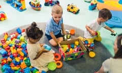 toddlers enjoying building blocks, cars, ships and other plastic toys in kindergarten. High quality photo<br>2K72D65 toddlers enjoying building blocks, cars, ships and other plastic toys in kindergarten. High quality photo