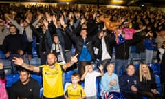 Southend United fans celebrate after being rescued by a last minute bid to buy the club.
