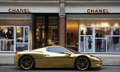 A gold luxury car outside a Chanel branch in Chelsea, London