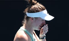 Ukraine's Elina Svitolina sobs after a back injury forces her to forfeit her singles match against Czech Republic's Linda Noskova on day nine of the Australian Open.