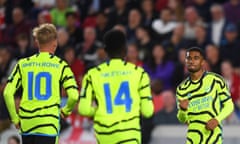 Emile Smith Rowe, Eddie Nketiah and Reiss Nelson celebrate together.