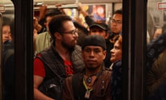 Passengers struggle to fit onto an overcrowded train at the Balderas metro station in Mexico City.