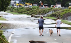 Flood waters cover a road in Strathpine on Brisbane’s northern fringe after heavy rain lashed south-east Queensland.