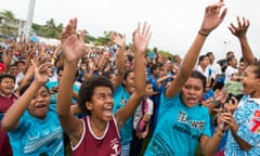 Fijians celebrate the victory of their Sevens rugby team against Britain in the final at the Rio Olympics, inside ANZ stadium in Suva on August 12, 2016. Fijians erupted in celebration setting off flares and dancing in the streets after their Sevens rugby team won the South Pacific nation’s first ever Olympic medal -- and gold at that. / AFP PHOTO / Feroz KhalilFEROZ KHALIL/AFP/Getty Images